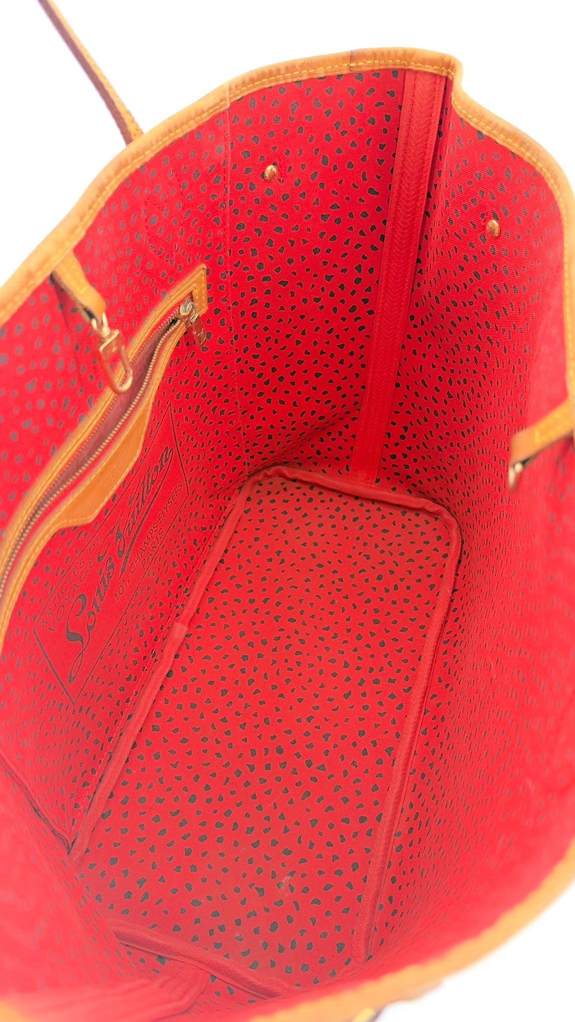 Kusama Neverfull interior top-down view, red dot lining