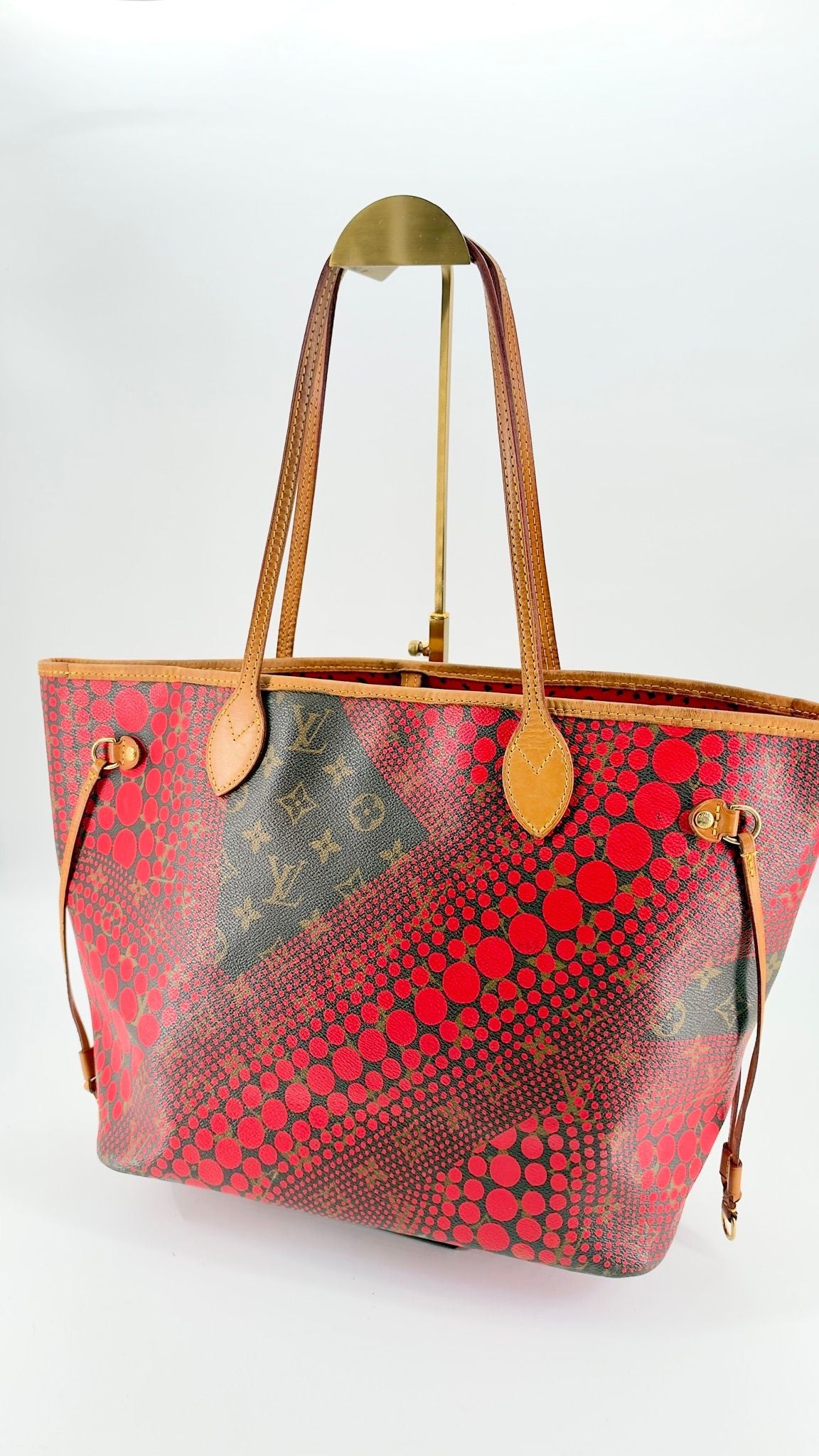 Kusama Neverfull MM full view on stand
