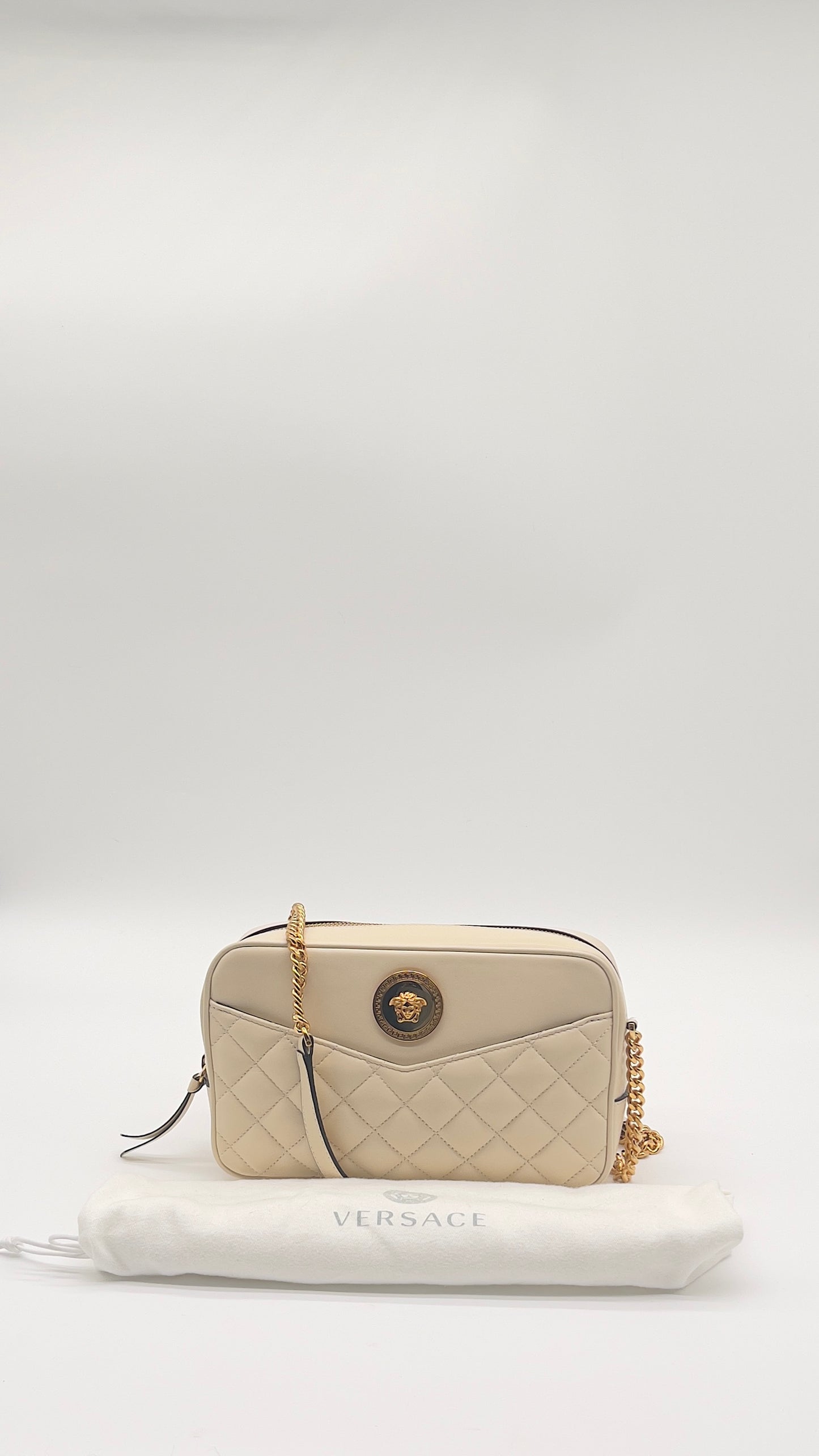 Pre-Loved Ivory Elegance
Versace La Medusa Quilted Lambskin Crossbody Camera Bag