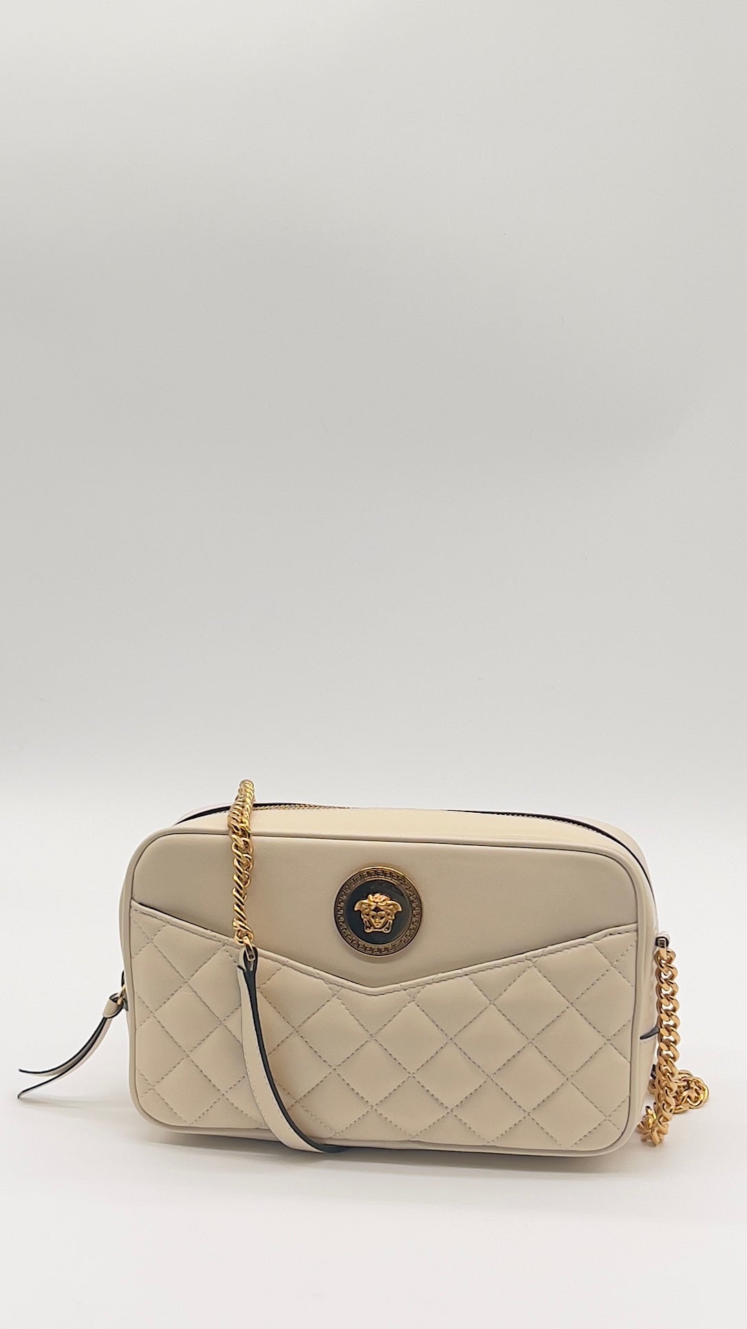 Pre-Loved Ivory Elegance
Versace La Medusa Quilted Lambskin Crossbody Camera Bag