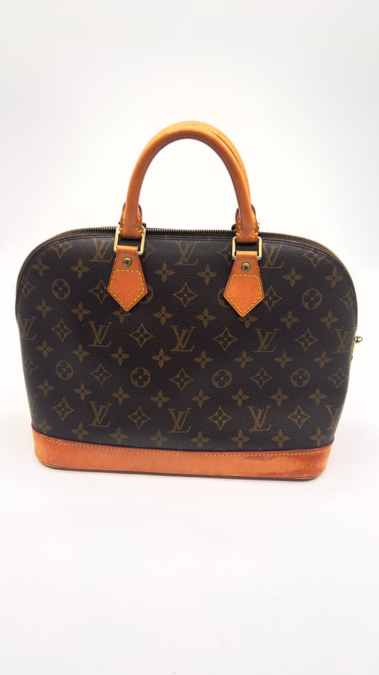 Pre-Owned Louis Vuitton Alma Monogram Canvas Handbag - Classic Elegance with Authentic Character