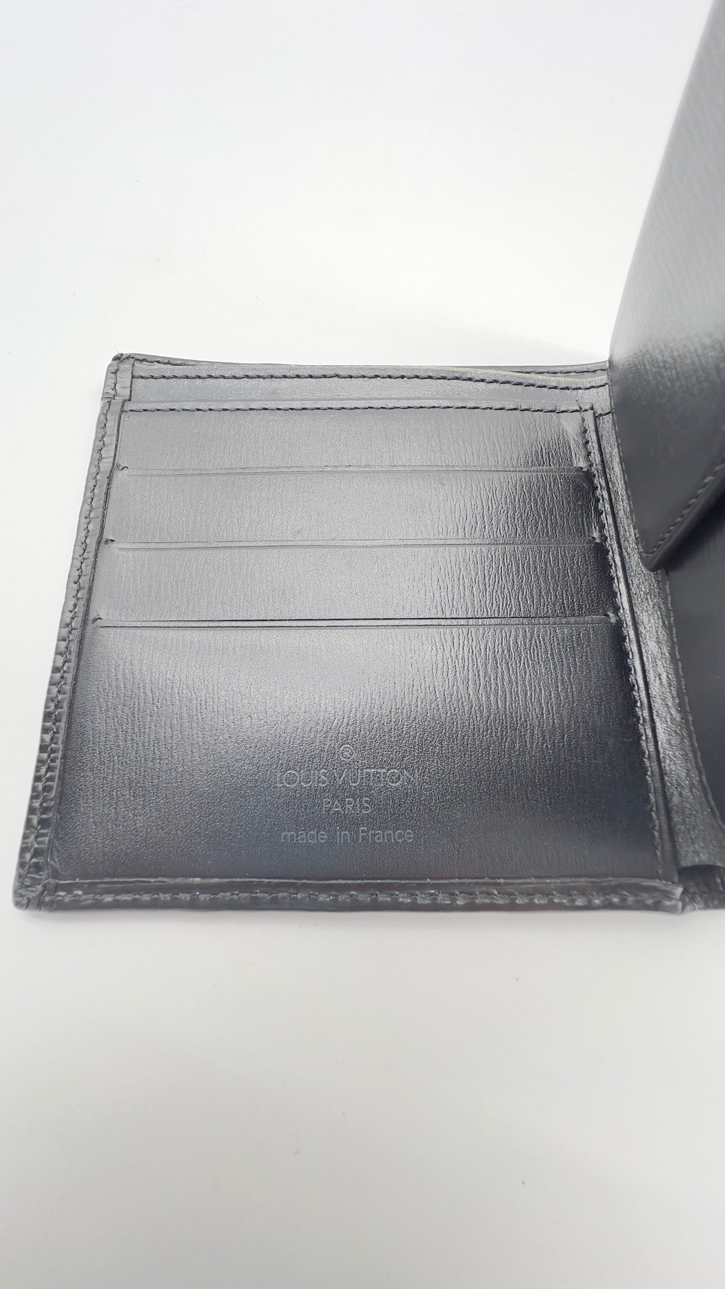 Pre-loved Authentic Louis Vuitton Epi Leather Multiple Wallet in Black - Good Condition