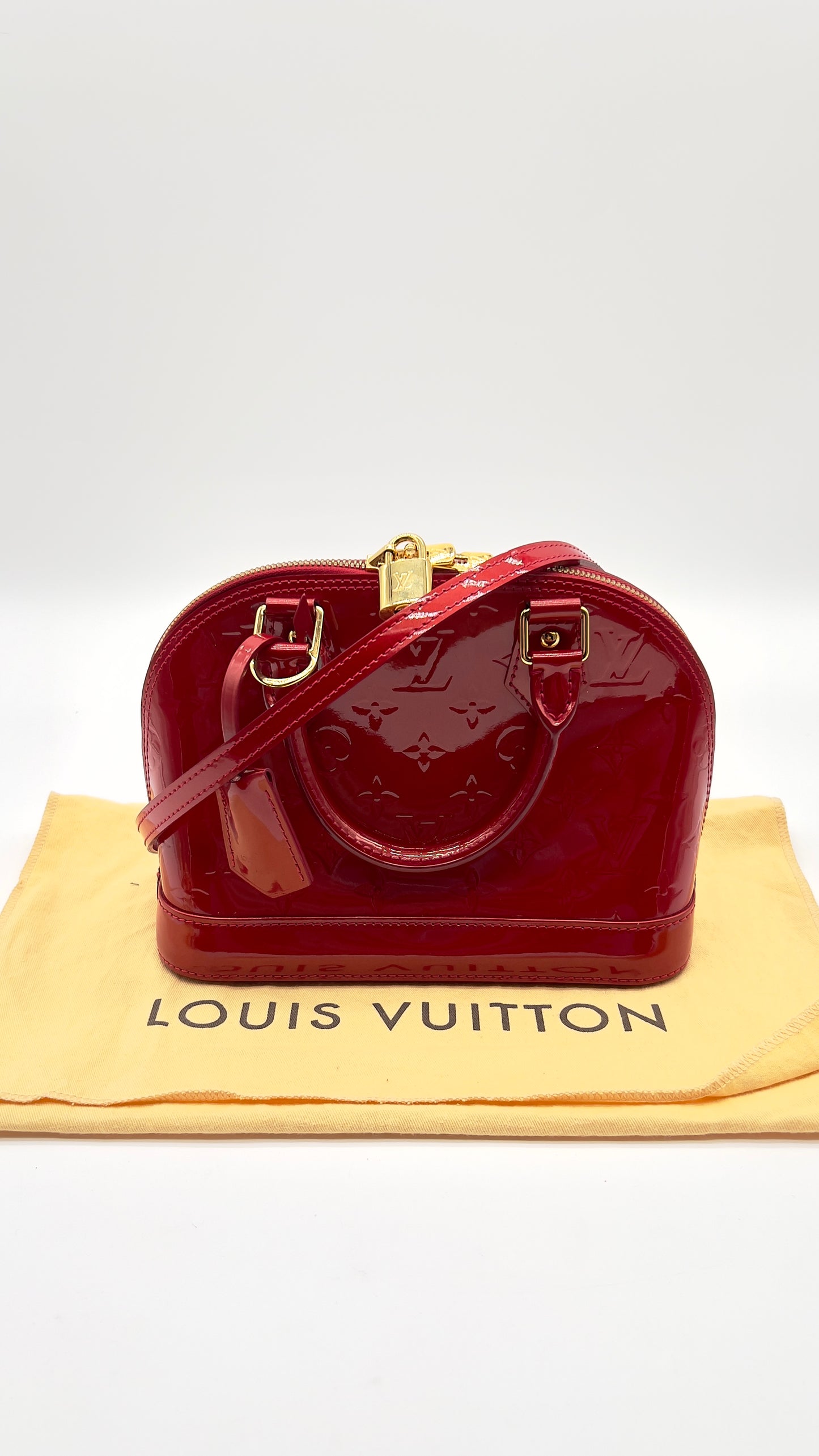 Pre-Owned Louis Vuitton Alma BB in Red Vernis Leather with Strap, Dust Bags Lock, and Keys