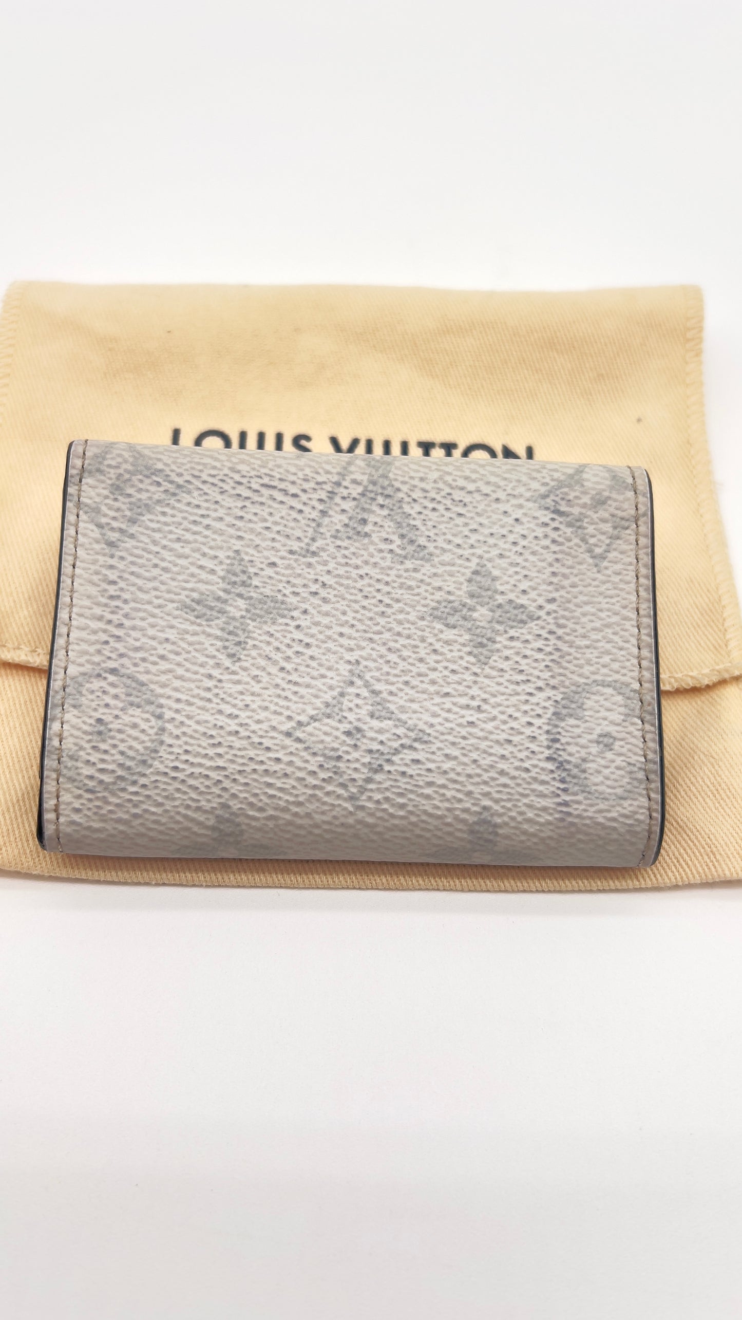 Pre-Loved Authentic Louis Vuitton Discovery Compact Wallet Monogram Coated Canvas & Taiga Leather