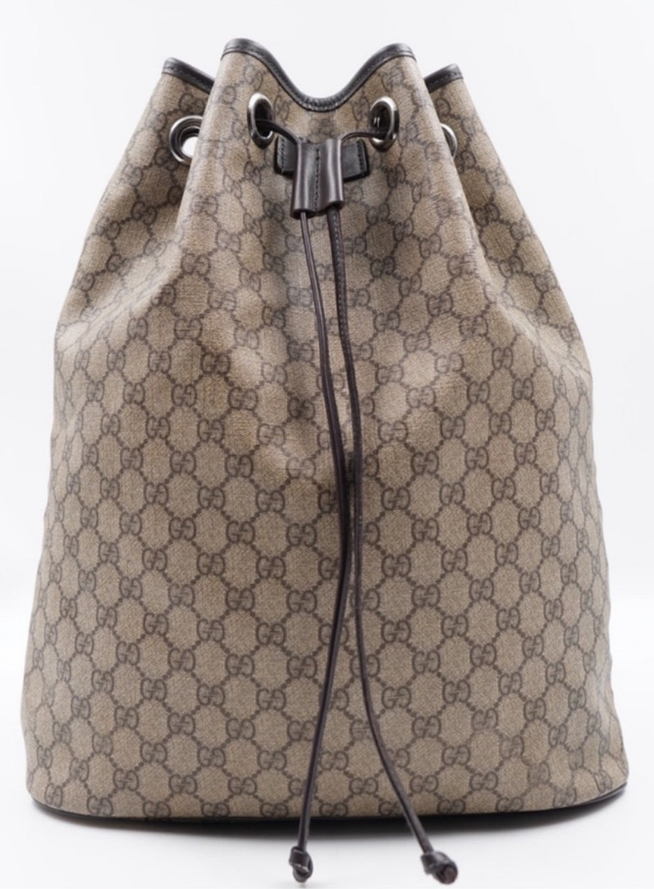 Pre-Loved GUCCI GG Canvas Drawstring Backpack with Silver-Tone Hardware and Leather Trim