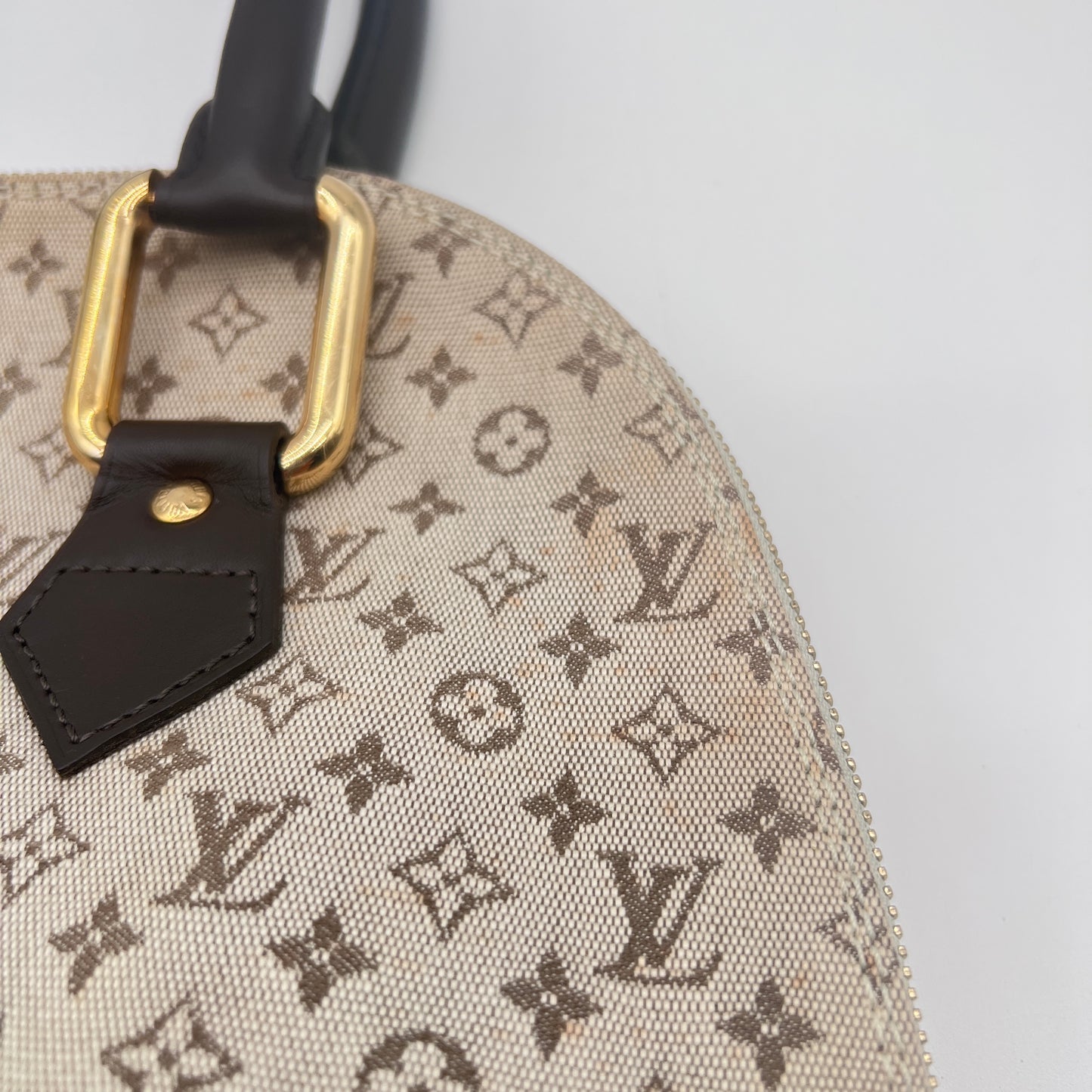 Louis Vuitton Alma Haut Handbag in Khaki Monogram Mini Lin Canvas with Leather Trim – Iconic Style and Timeless Elegance