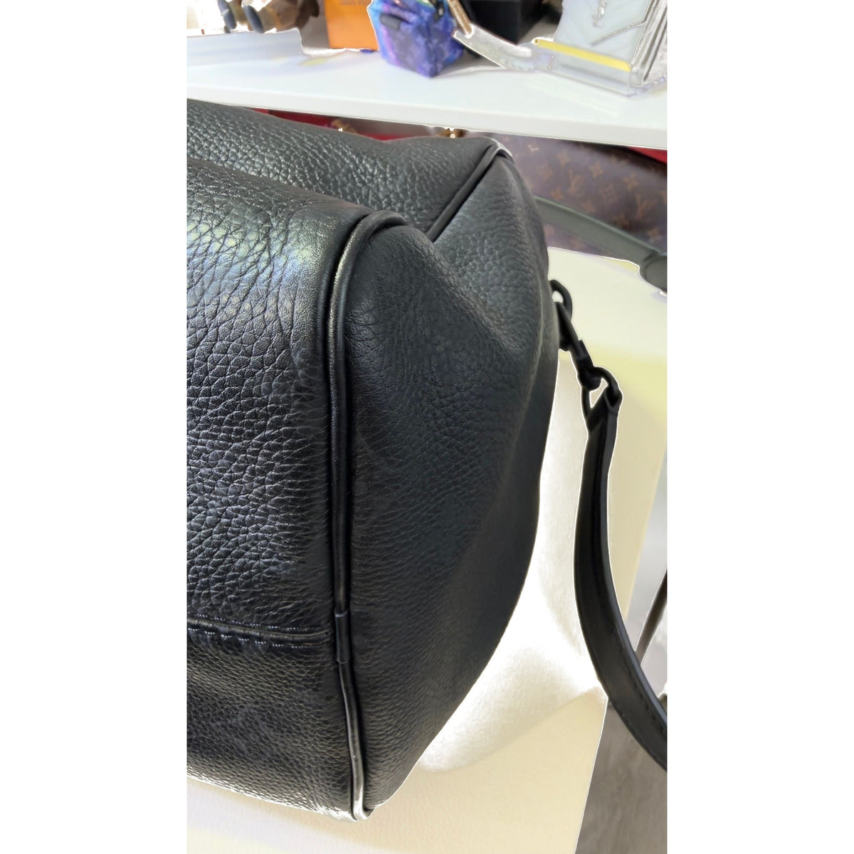 Close-up of side seam and piping with shoulder strap